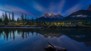 Mountain lake trees clouds stars - the foreground and a sky free wallpaper