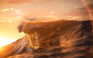 Wave breaking large ocean sunset - in the ocean free wallpaper