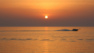 Boat sunset ocean cloud horizon - the distance behind free wallpaper for desktop