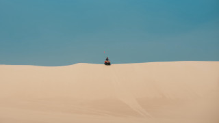 Desert quad rider blue sky - a clear day free wallpaper for desktop