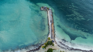 Beach pier boat dock tiltshift - concrete art free wallpaper
