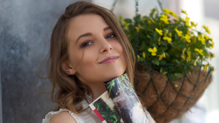 Woman holding plant coffee smiling - magazine free wallpaper