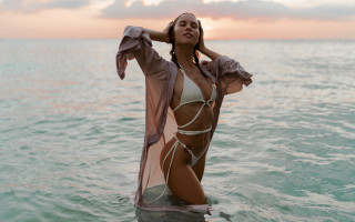 Woman bikini water arabesque fashion - her arm behind her head free wallpaper