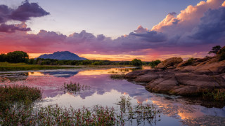 Sunset lake mountain clouds dusk - a beautiful sunset over a lake free wallpaper