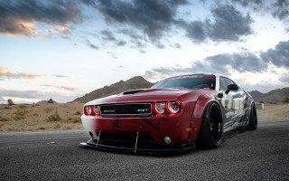 Red sports car cloudy mountains - the side of the road free wallpaper for desktop