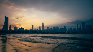 City skyline water sunset clouds - a sunset in the background free wallpaper for desktop