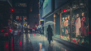 Woman umbrella rain night christmas - a street holding free wallpaper for desktop