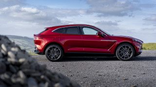 Red car mountain clouds 3d - side profile free wallpaper