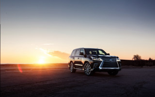 Black suv sunset parking lot - a black suv free wallpaper