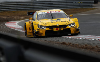 Yellow racecar race track tiltshift - a yellow race car free wallpaper