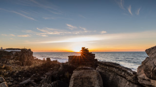 Rock sunset ocean tilt shift - a rock near the ocean free wallpaper