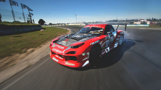 Red race car flag fisheye - a red race car free wallpaper