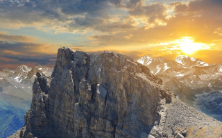 Mountain rock formation sunset clouds - matte painting free wallpaper