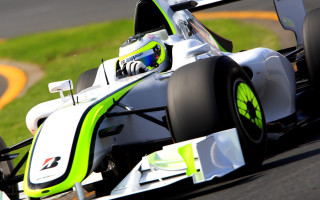 Man racecar track grass yellowline - a man driving free wallpaper