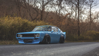 Blue car forest autumn leaves - the side of a road next free wallpaper