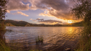 Lake sunset clouds trees bushes - a sunset in the background free wallpaper for desktop