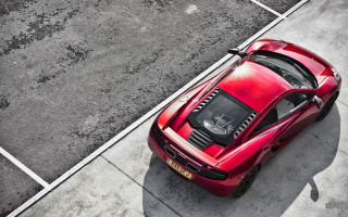 Red sports car parking meter 2 - the side of the road free wallpaper for desktop