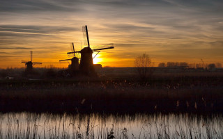 Windmill sunset reflection beach cityscape - a windmill free wallpaper