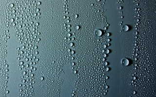 Water droplets glass blue black - a close up of water droplets free wallpaper