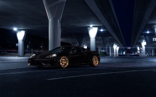 Black sports car night parking - a black sports car free wallpaper