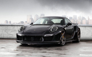 Black porsche city rain matte - a city skyline in the background free wallpaper