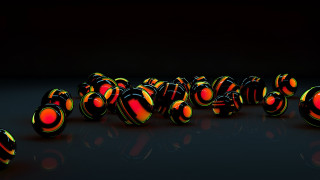 Colorful balls reflections dark room - a group of balls free wallpaper