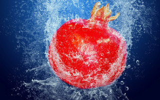 Red apple water splashes blue - free winter wallpaper