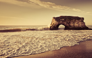 Rock formation beach waves person - the shore of the beach free wallpaper