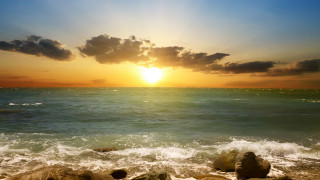 Sunset ocean cloud rocky beach - a sunset over the ocean free wallpaper