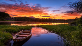 Lake sunset boat landscape sky - a colorful sky in the background free wallpaper
