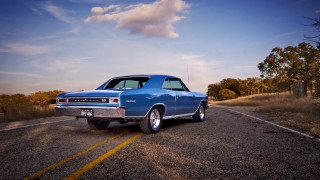 Blue car country side field - a blue car free wallpaper