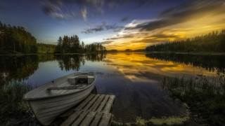 Docked boat lake sunset clouds - a boat free wallpaper for desktop