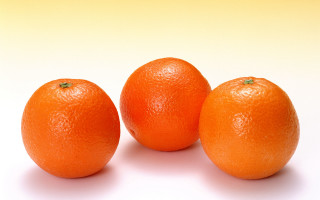 Three oranges white surface yellow - mingei free wallpaper