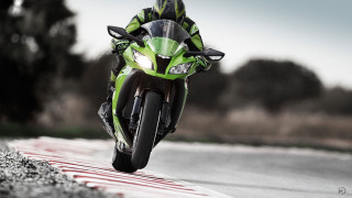 Rider green motorcycle race track - a race track free wallpaper