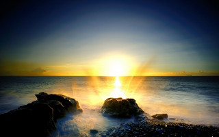 Sunset ocean rocks sky light - the foreground and a body of water free wallpaper for desktop