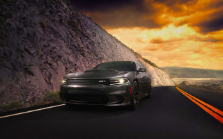 Black dodge charger mountain road - a yellow line free wallpaper