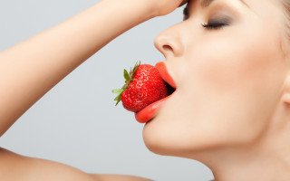 Woman strawberry licking closeup food - a strawberry free wallpaper