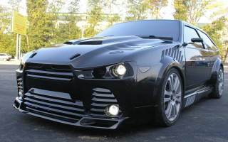 Black car parked trees digital - a black car free wallpaper