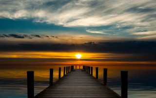 Sunset dock clouds water cityscape 3 - tranquil free wallpaper