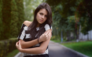 Woman crossed arms outdoors portrait - over her chest free wallpaper