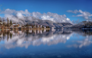 Lake mountain town clouds reflections - a town free wallpaper for desktop
