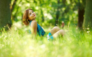 Woman sitting grass park sky - the sky and trees free wallpaper