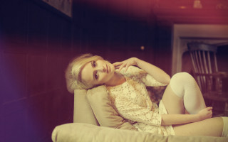 Woman couch crossed leg hand - emma geary free wallpaper