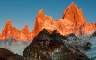 Mountain range snow capped sunset - a few snow covered mountains free wallpaper