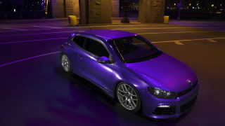 Purple car night street starry - side and a building in the background free wallpaper