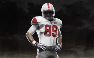 Football player white uniform red - number free wallpaper