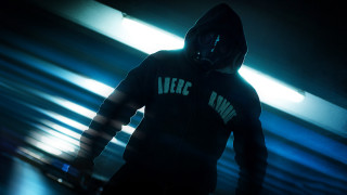 Hooded man flashlight military ocean - a flashlight free wallpaper