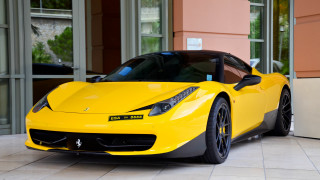 Yellow sports car building door - a yellow sports car free wallpaper