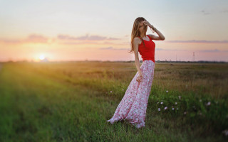 Woman dress field sunset blonde - the sun setting behind her free wallpaper