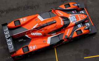 Orange race car parking lot - yellow line free wallpaper